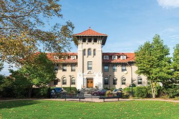 Queen college building front view