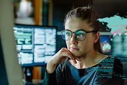 Female student watching on the computer screen