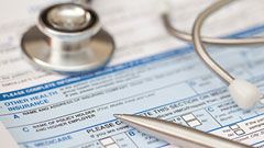 Medical stethoscope isolated on application form