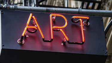The word ART showing on the direction holding