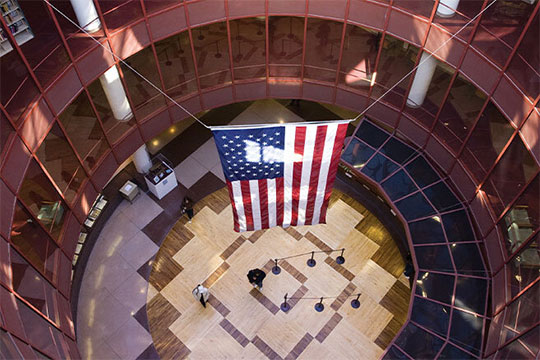National flag of USA waving in the auditorium