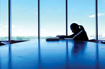 Female student studying in the window view